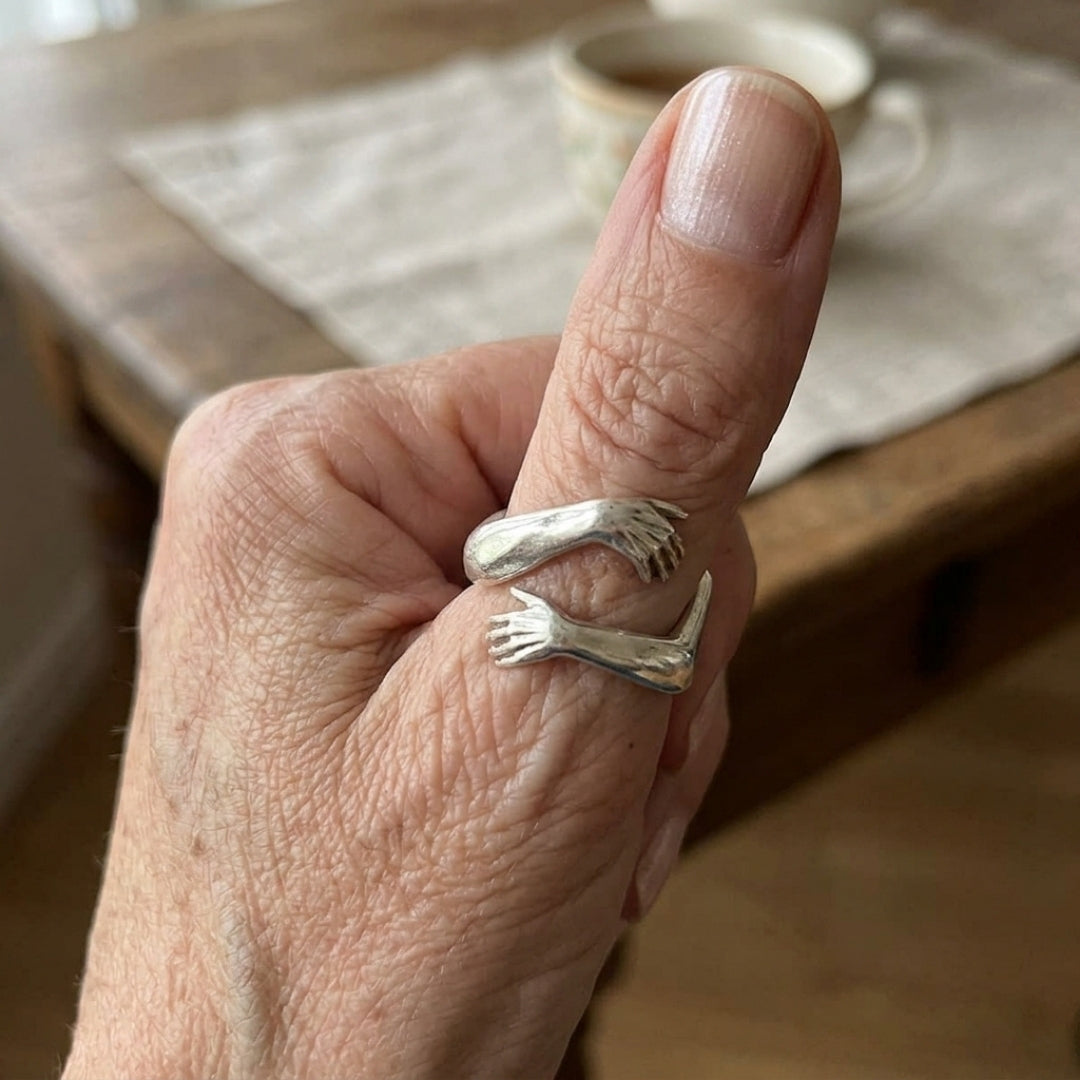 Silver Embrace Hands Ring