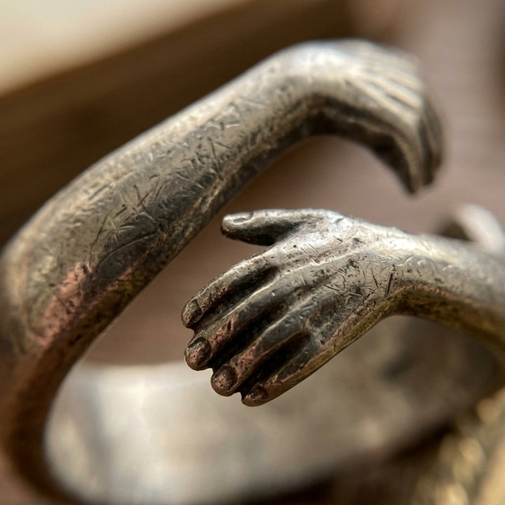 Silver Embrace Hands Ring